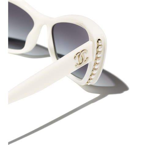 how much do chanel sunglasses cost|Chanel sunglasses with white trim.